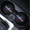 Merkloos Set Van 2 Bekerhouder Inleggers - Performance - Lederen Look - Geschikt Voor BMW - Past Bij Oa. BMW 1-serie / 3-serie / 5-serie / E46 / E90 / E92 / M3 / M4 / M5 / X1 / X3 / X5 - Lederen Bekerhouders Onderzetters - Zwart - Auto Accessoires